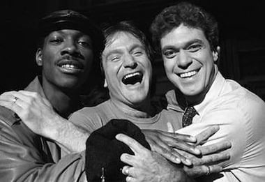 Robin Williams, center, with Saturday Night Live cast members Eddie Murphy, left, and Joe Piscopo, Feb. 10, 1984. (AP Photo/Suzanne Vlamis)