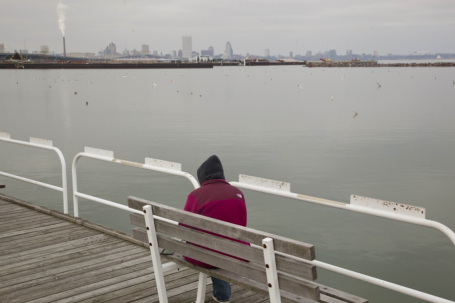 A woman sketches a scene of Milwaukee's lakefront Tuesday, Feb. 1, 2012, in Milwaukee. (AP Photo/Jeffrey Phelps)