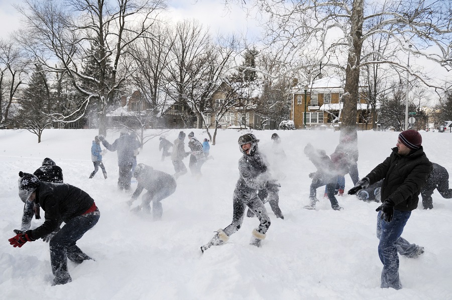 Students battle in a snowball fight on the Indiana University campus in Bloomington, Ind. (AP Photo/Indiana Daily Student, James Brosher)